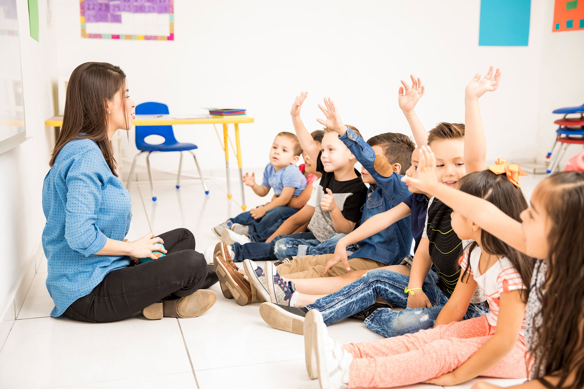 Teacher using EnrolNow kindergarten management system